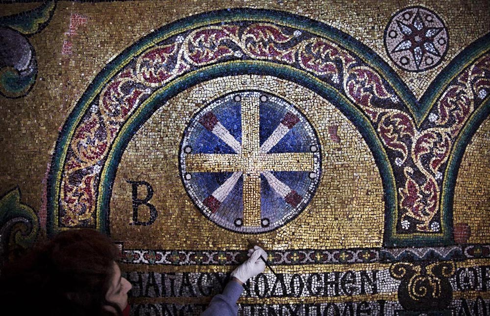 restoration-expert-works-on-mosaic-inside-Church-of-the-Nativity